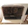 Image 1 : Reel to reel recorder with a box of reels