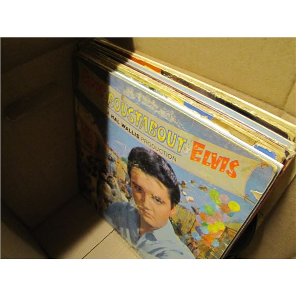 Lot of records - some Elvis and others as pictured - I didn't go through all the boxes