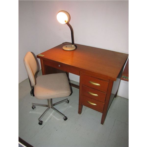Single pedestal desk with lamp and chair