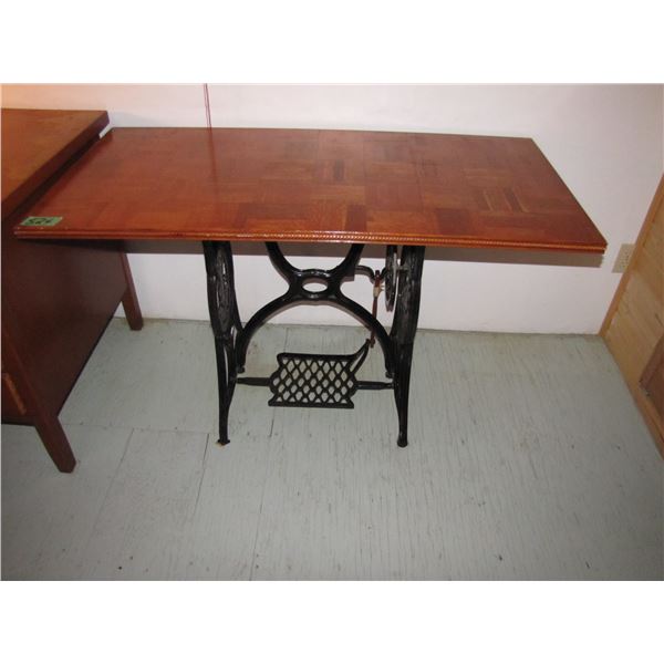 Decorative table made from treadle sewing machine frames
