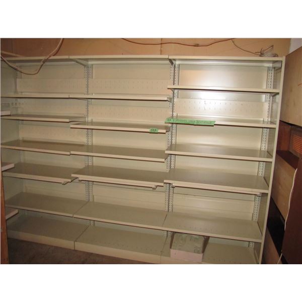 Three sections of metal shelving for storage