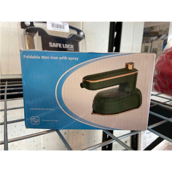 Foldable mini clothing iron with spray function