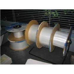 4 PARIAL ROLLS OF "AUTOBAG" BAGS W/ DISPENSING RACK