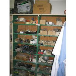 CONTENTS OF 2 GREEN SHELVES ALONG EAST WALL