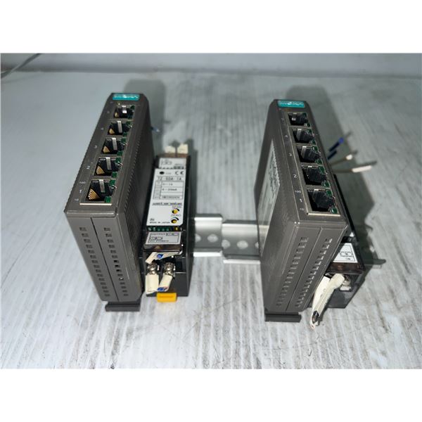 (2) Moxa #EDS-205 w/TZ-5DA-1A