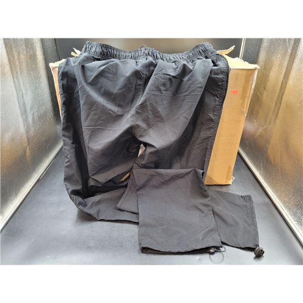 Box Full Of Black Track Pants