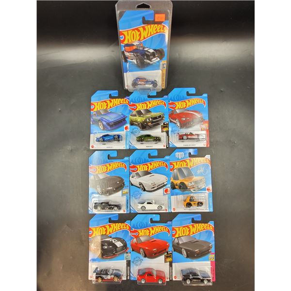 10 Sealed Hot wheels Including Treasure Hunt Mod Rod