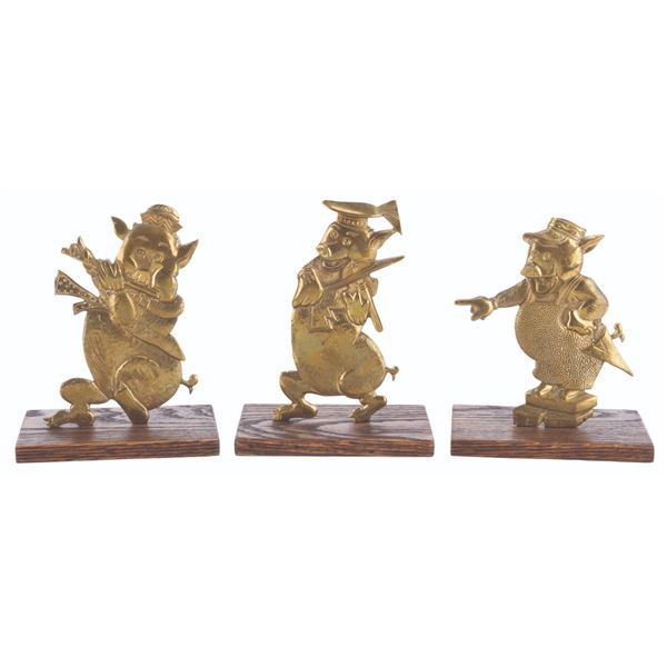 A Set of Metal Three Little Pigs.