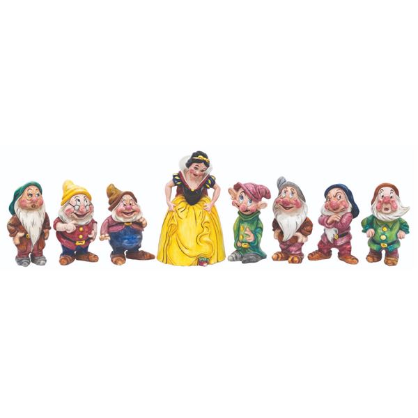 A Rare Set of French Ceramic Snow White & Dwarfs.