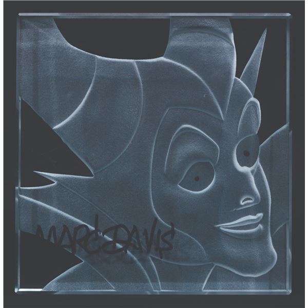 A Marc Davis Signed Maleficent Glass Paperweight.