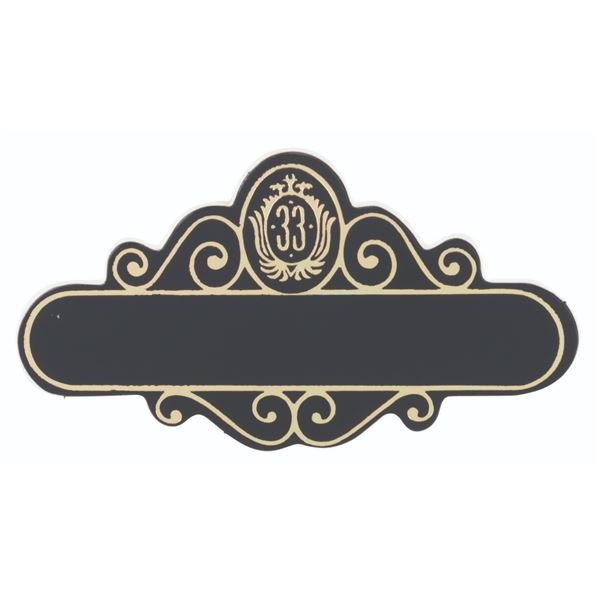 A Club 33 Cast Member Name Badge.