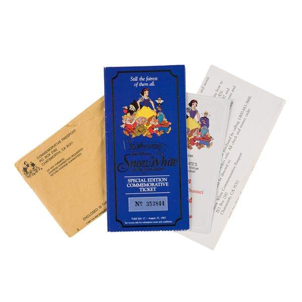 A Snow White 50th Anniversary Ticket and Coin.