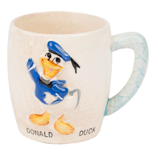 A 1961 Donald Duck Mug.