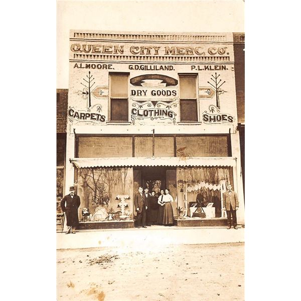 Real Photo Store Front Queen City Merc. Co. Postcard