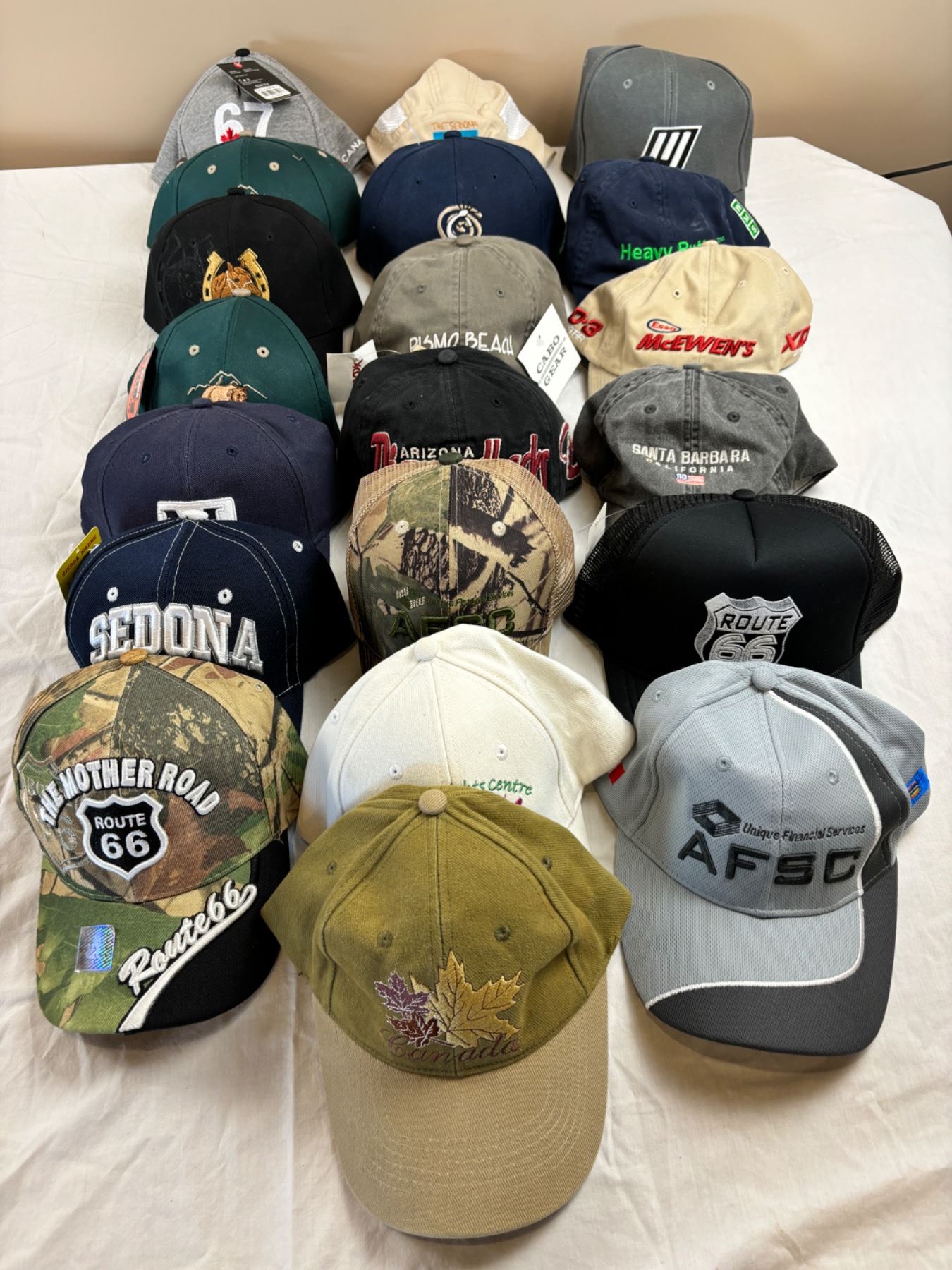 Assorted ball caps - Sunrise Estate Services Ltd