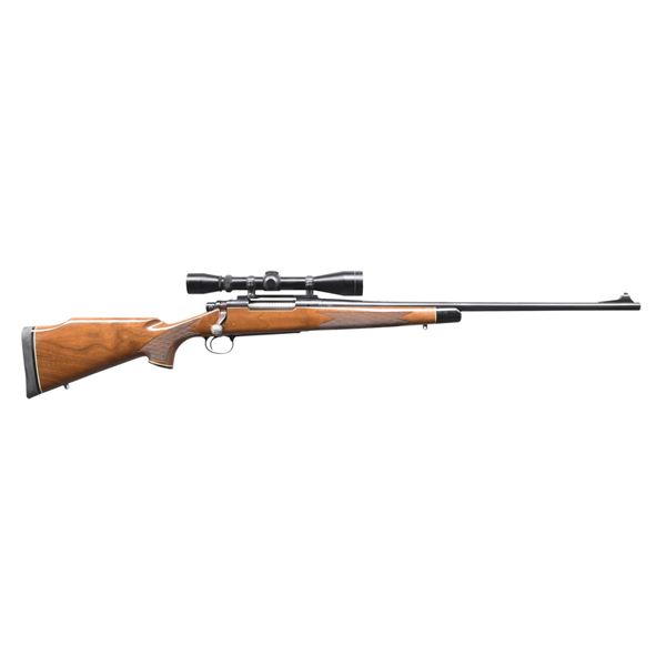 REMINGTON 700 BDL CUSTOM DELUXE BOLT ACTION RIFLE.