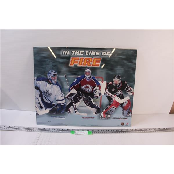 In The Line of Fire Hockey Goalies Poster in Frame - 20" x 16"