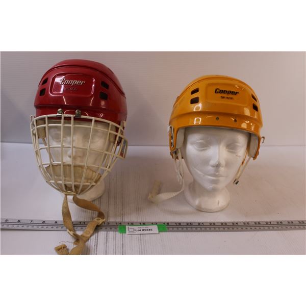 (2) Cooper Hockey Helmets