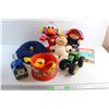 Image 1 : Elmo Toy, Neck Pillow, John Deere Tractor Toy, Cabbage Patch Doll, Pop It and Assorted Toys