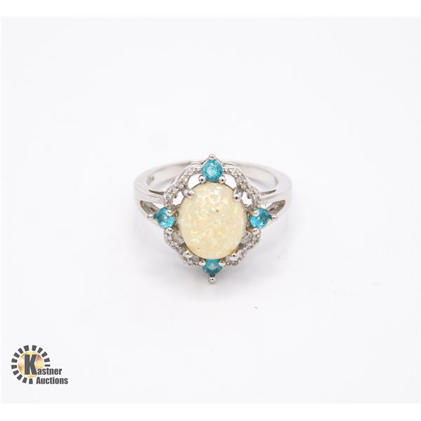 LARGE STERLING SILVER RING WITH CENTRE STONE