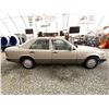 Image 11 : A12I -- 1991 MERCEDES 300 E, GOLD, 266004 KMS