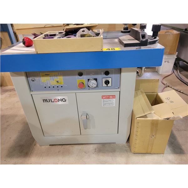 Rulong spindle Moulder, 3phase, 5Hp, forward/reverse comes with various parts and blades, next to ne