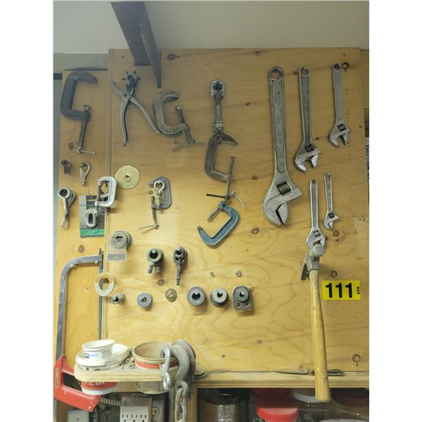 Spacers, c-clamps, crescent wrenches, hammer, eye hooks, chain hooks