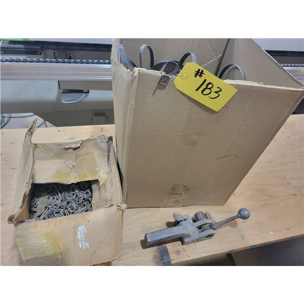 Banding material, 1/2" black strapping, metal buckles, and tightening tool