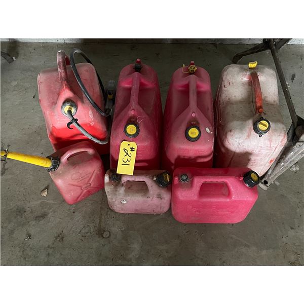 7 jerry cans, various sizes