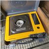 Image 2 : ROLL OF CELLOPHANE WITH WOOD TOOLBOX AND CAMP BURNER