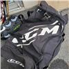 Image 3 : HOCKEY STICKS, BAG OF GEAR AND WATER BOTTLES