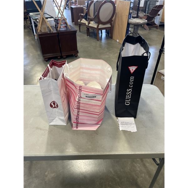 ASSORTED DESIGNER BRAND CLOTHES, LULULEMON SHIRT MDEIUM, CLAVIN KLEIN SHIRT LARGE AND JEANS  SIZE 11