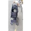 Image 1 : BLACK FOUR WHEELED PET STROLLER