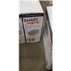 Image 2 : FOUR NEW SMART MOVE TOILET SEAT RAISER, WITH LIDS, 4"