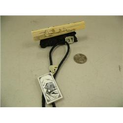 4" scrimshawed ivory hunting scene and ivory bolo tie (2)