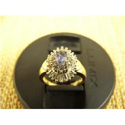 Tanzanite and diamond lady's ring, 14K yellow gold, tanzanite oval, faceted, approx. 1 carat, semi t