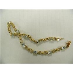 Aquamarine bracelet 14K yellow gold, oval faceted, approx. 3.70 carats, transparent light sky blue, 