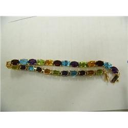 Multi-gemstone bracelet, 14K yellow gold, Peridot, amethyst, garnet, blue topaz, oval faceted, appro