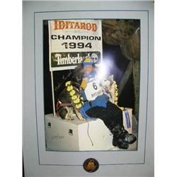 Signed and numbered photo with silver coin of 1994 Iditarod winner Martin Buser (229)