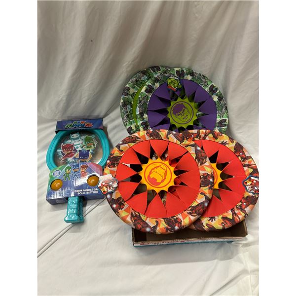 Avengers, frisbees, and drum paddle game