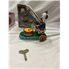 Image 2 : Vintage tin drumming animal with key