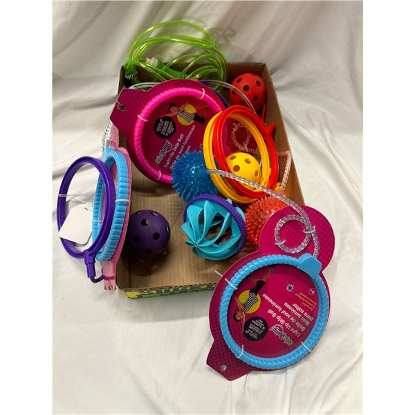 Skipping toys and assorted balls