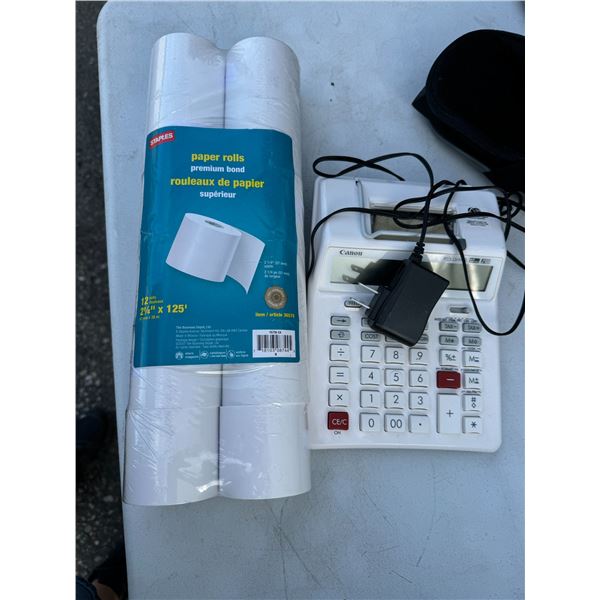 Calculator and paper rolls