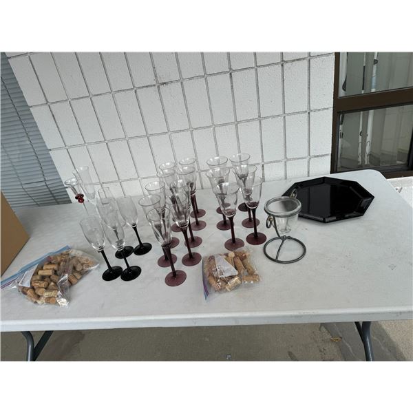Stemware, corks and plate