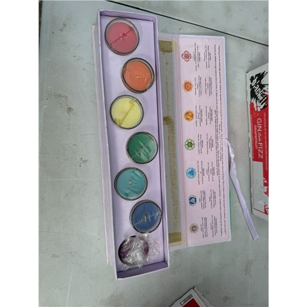 Aromatherapy set of seven chakra candles with glass holders, missing one holder