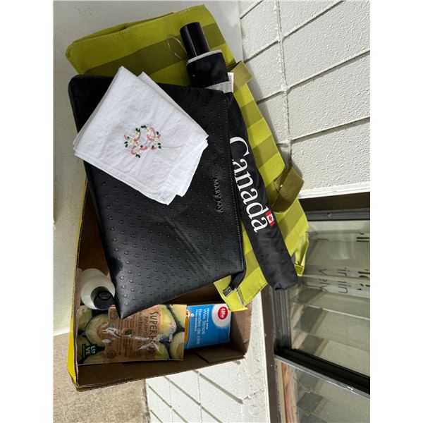 Wax strips, umbrella, Mary Kay bag, and other items
