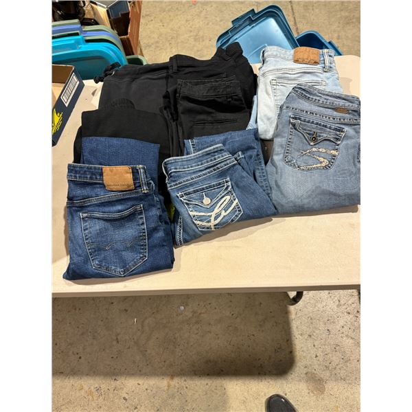 Assorted jeans and sweatpants, etc.