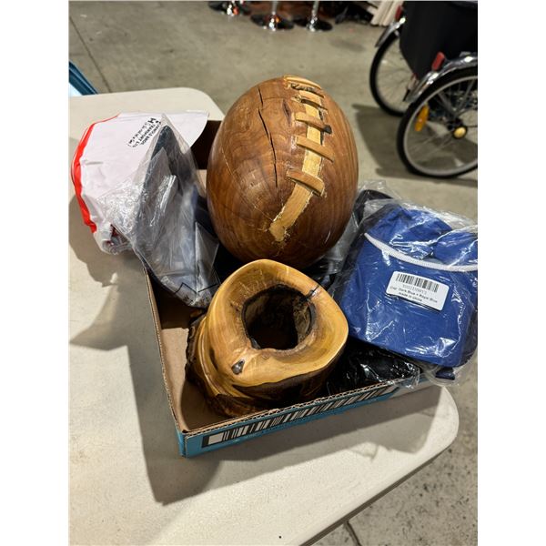 Wood carved football caps and other items