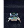 Image 1 : 7.10 CT DARK GREEN RECTANGULAR SHAPED MOISSANITE SET IN STERLING SILVER WITH 2 ROUND CUT MOISSANITE