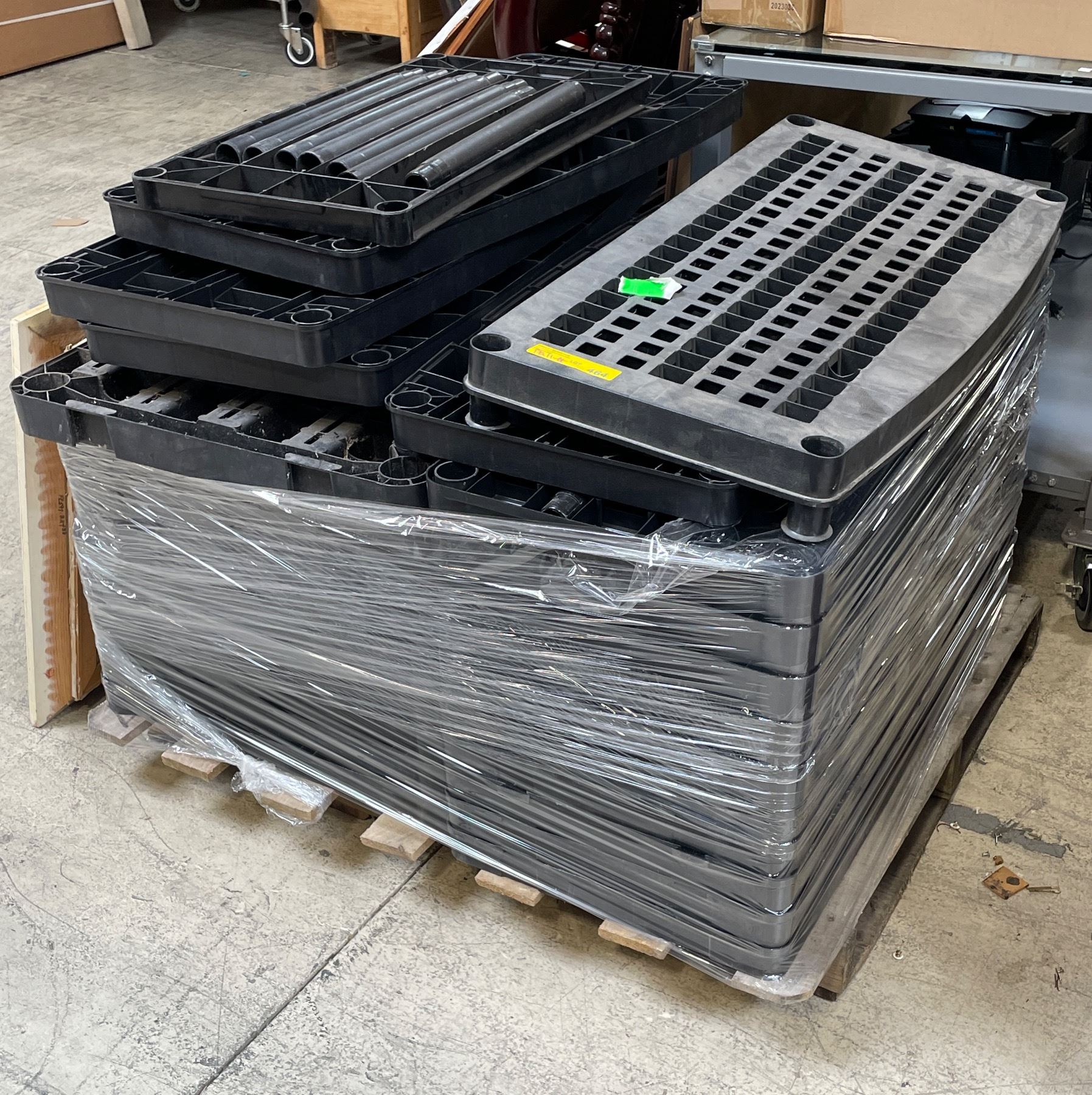 Pallet full of assorted plastic racking